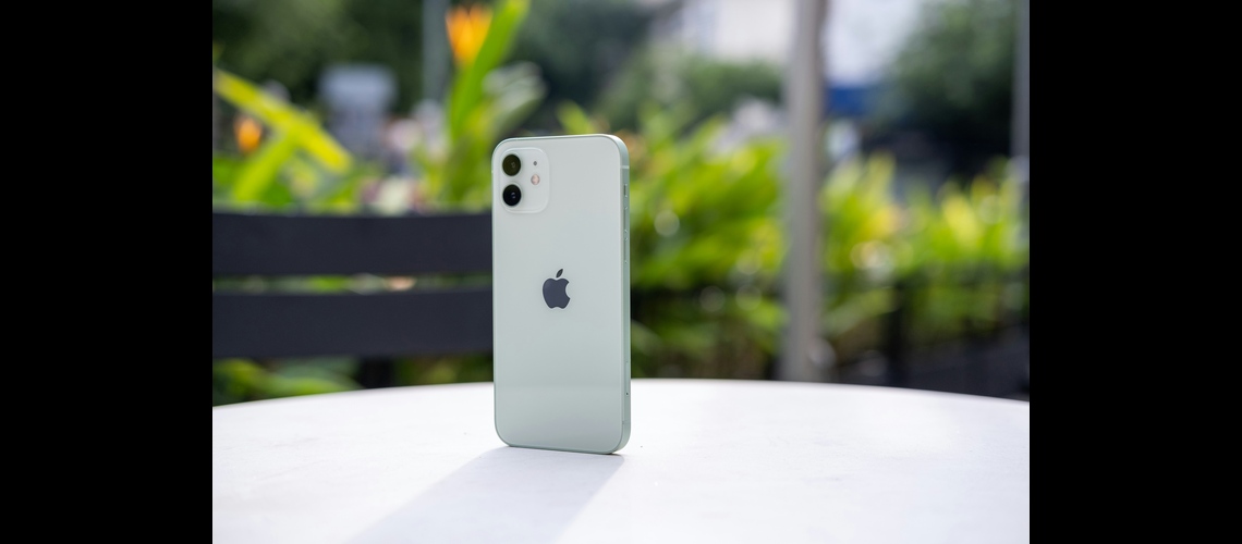 iPhone 12 standing on a table - Is iPhone 12 worth it in 2026?